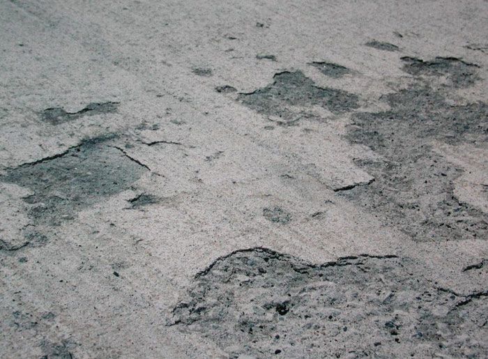 Concrete spalling on basement garage floor, Drummoyne