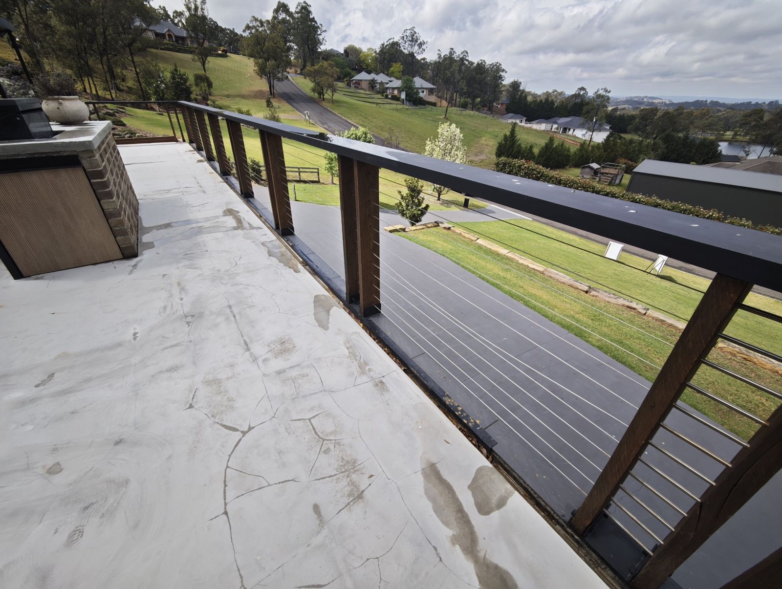 Cracked concrete deck slab with cable balustrade, Picton NSW